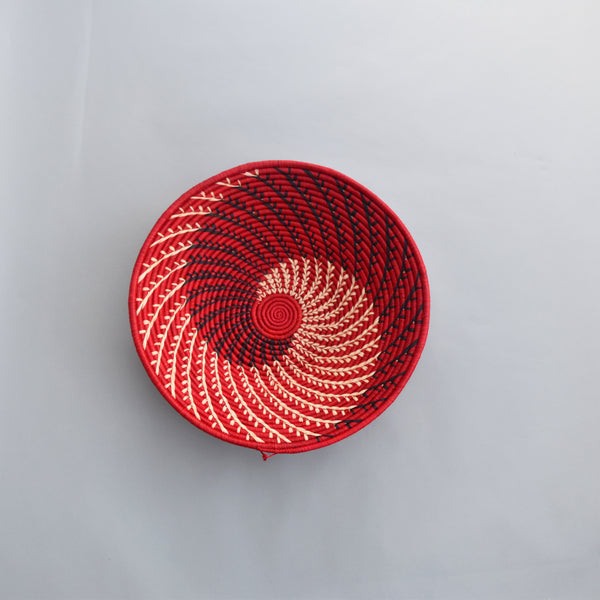 Hand woven straw. A tradition and art which has been part of Ugandan culture for centuries.  With all of the materials used being natural products or recycled, we also believe this is a lovely way of making use of natural resources the world has to offer and making positive changes to become more sustainable.  Beautifully, unique, handmade basket made out of banana stalks and raffia fibres also known as the Ugandan basket. 