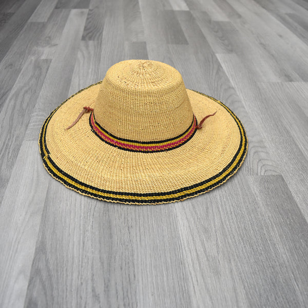 Bolga straw hat Look chic in the summer while protecting yourself from the UV rays. Whether it is to the beach, a day out, or for a party. This woven heart made from elephant grass is durable, Sustainable, and large enough to shield you from the sun.