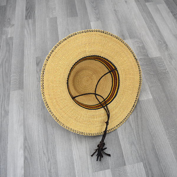 Bolga straw hat Look chic in the summer while protecting yourself from the UV rays. Whether it is to the beach, a day out, or for a party. This woven heart made from elephant grass is durable, Sustainable, and large enough to shield you from the sun.