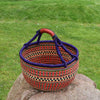 Bolga Market Basket_ Large Round Straw Basket_Rufina Designs This African straw basket also called Bolga basket is handwoven from elephant grass and dyed. It makes a great eco-friendly decorative bag, hamper basket, or storage basket.
